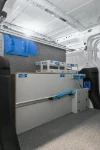 02_Courier pour maintenance intérieurs immeubles avec espace de chargement divisé en deux zones
