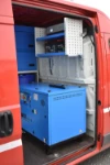 04_Paroi séparation cabine pour pompiers avec groupe électrogène compresseur et armoire suspendue