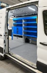 05_Dispositif arrimage valises avec sangle sur Transit pour plomberie