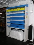 Lato sinistro Opel Movano con pianale, pannellatura, copriruota, ganci e rotaia per cinghie