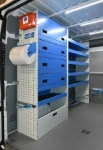 Lato sinistro Opel Movano con pianale, pannellatura, copriruota, ganci e rotaia per cinghie