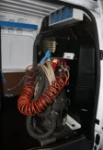 Aspirateur fixé au niveau de la porte latérale