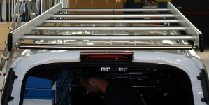 Porte-tout avec rouleau et barres de rétention latérales pour Connect