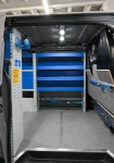 Revêtement de cloison, rayonnage et plancher avec rail intégré dans le Volkswagen Transporter
