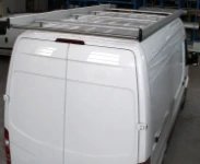 Système de transport sur toit pour fourgon plombiers